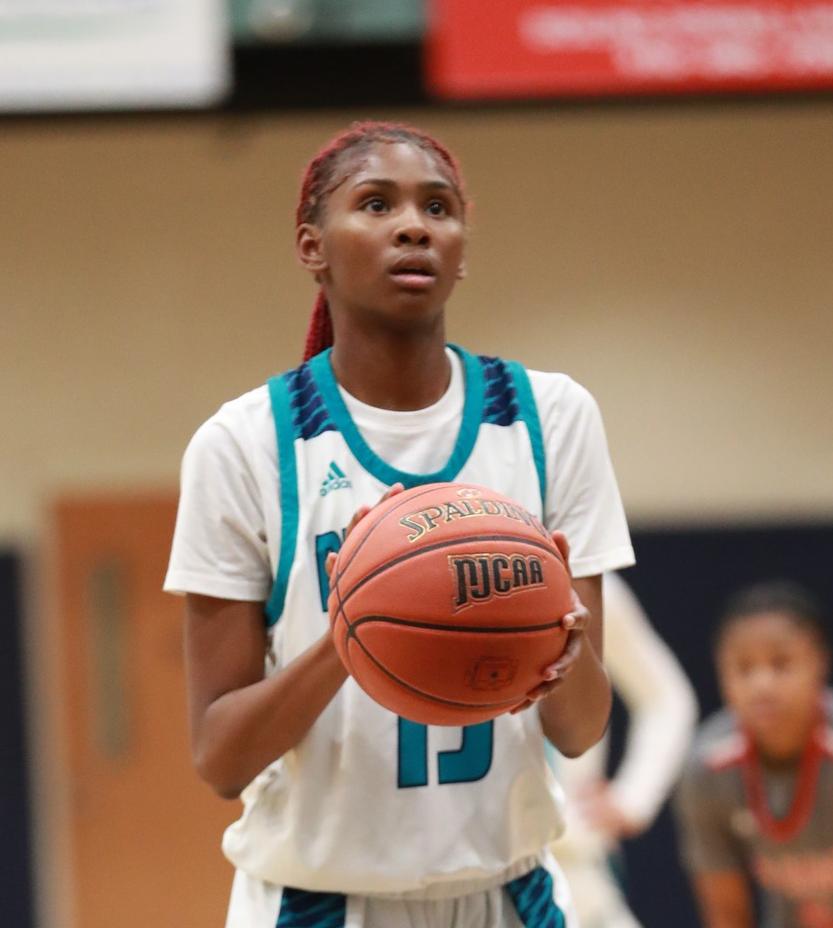 Shuntay Douglas led the Lady Dolphins with a career high 32 points